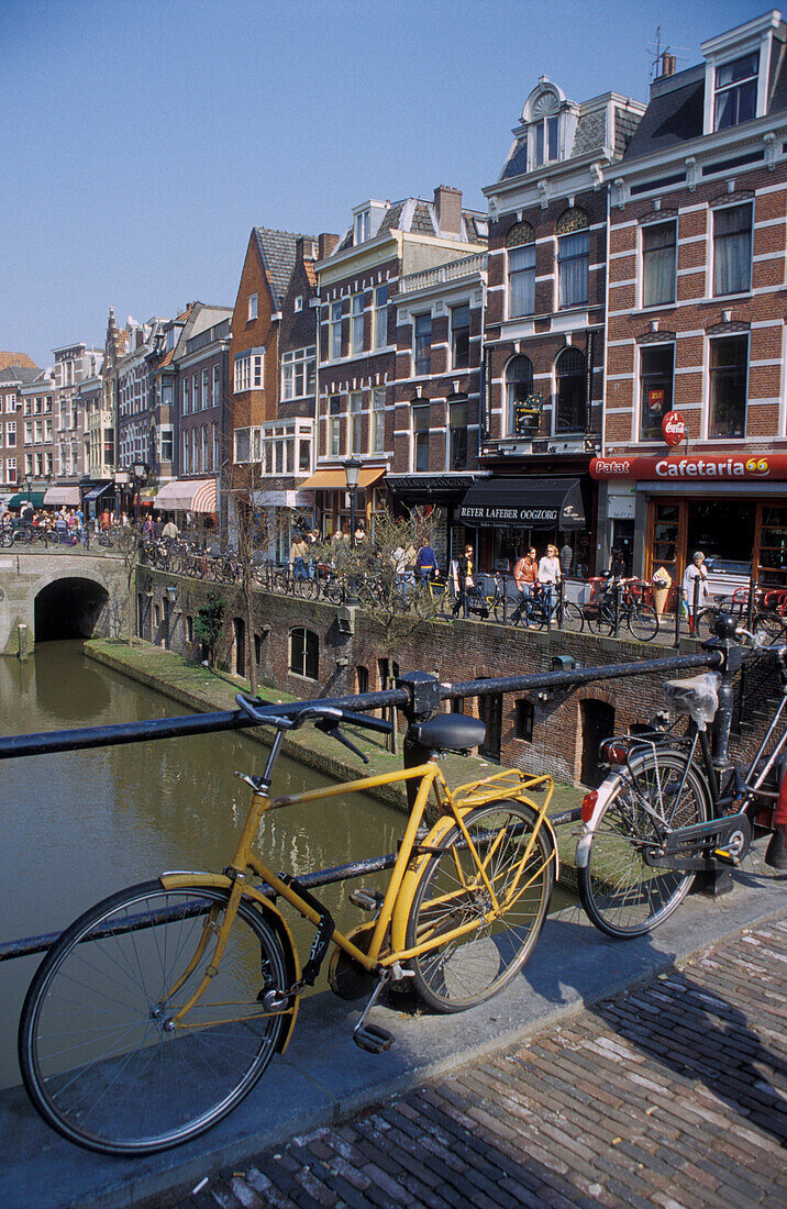 Bikes on a bridge and houses along Oude Gracht, Utrecht, Netherlands, Europe