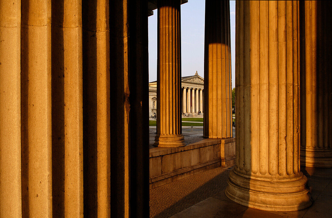 View through columns of the Propylaea to Glyptothek, King's Square, Munich, Bavaria, Germany