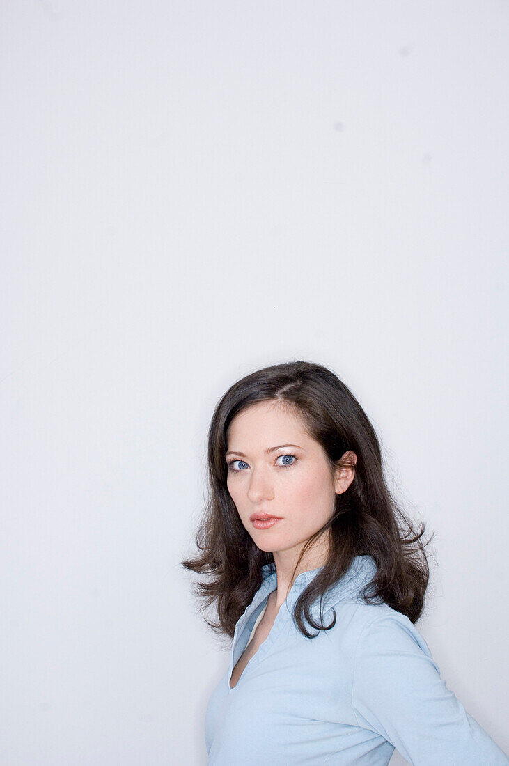 Young woman looking at camera, portrait