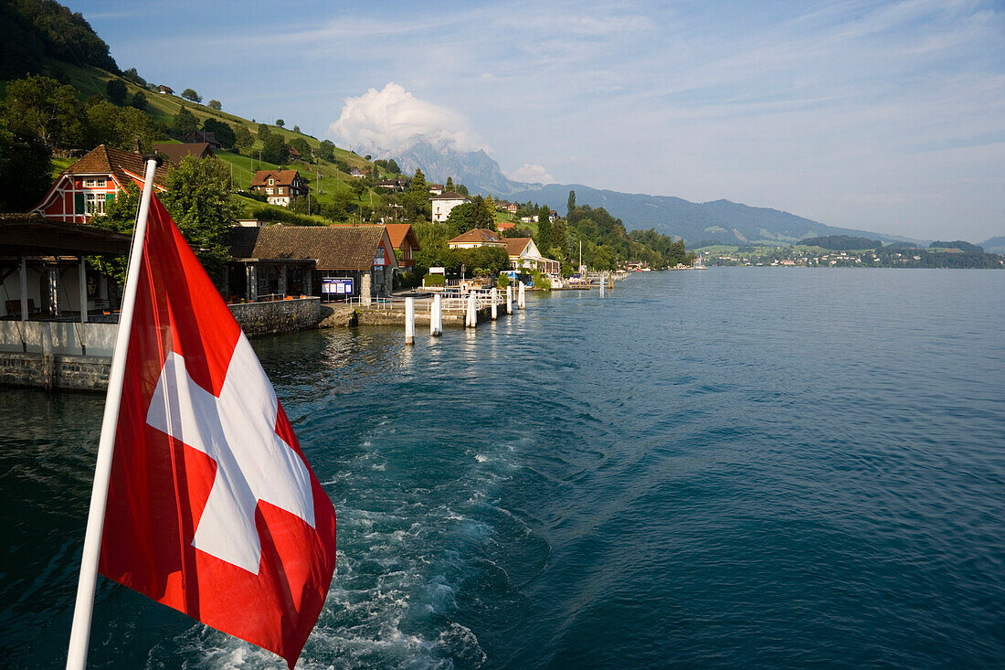 Swiss flag, Kehrsiten Bürgenstock, Pilatus (2132 m) in background, Kehrsiten Bürgenstock, Canton of Lucerne, Switzerland
