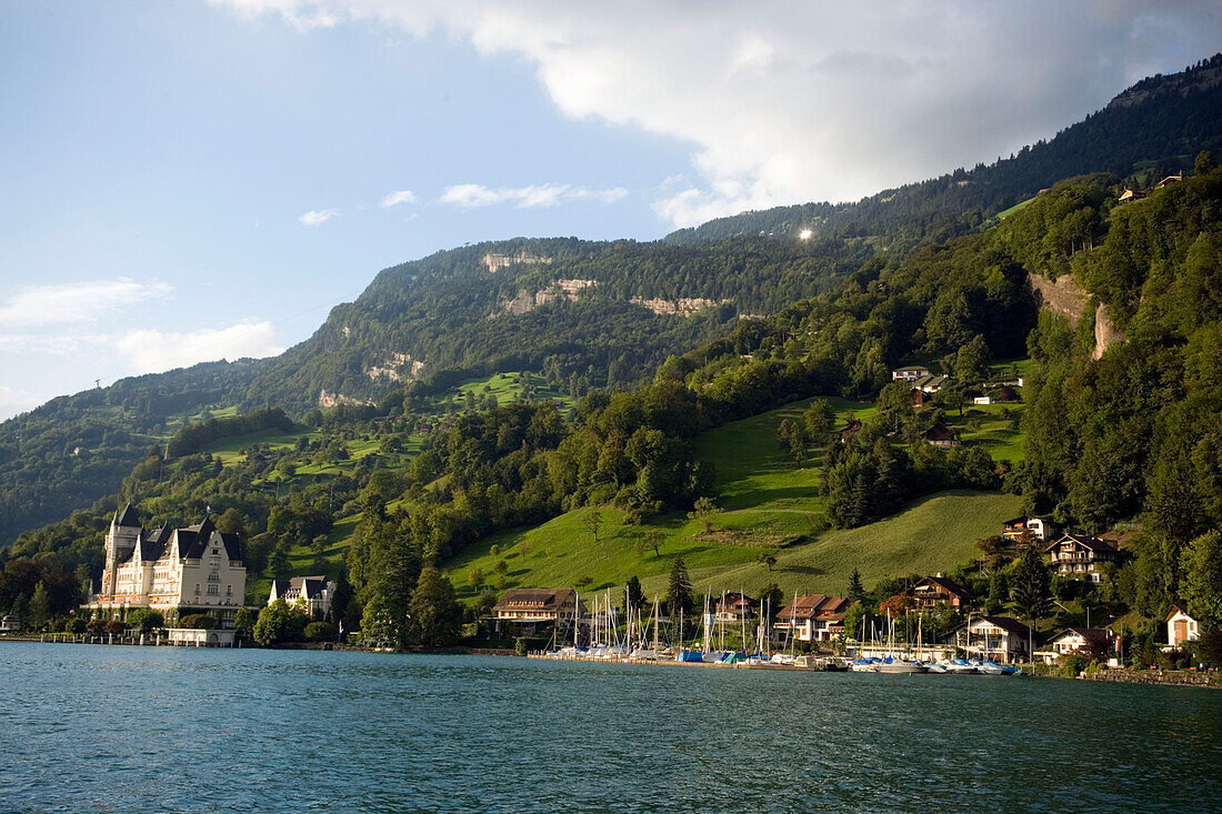 View over Lake Lucerne to Vitznau with Park Hotel Vitznau, Canton of Lucerne, Switzerland