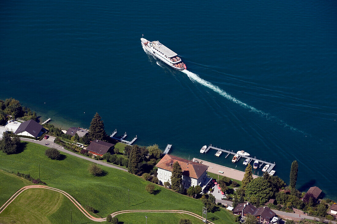 View from Burgenstock mountain (1128 m) over Lake Lucerne with excursion boat, Kehrsiten, Lucerne, Canton Lucerne, Switzerland