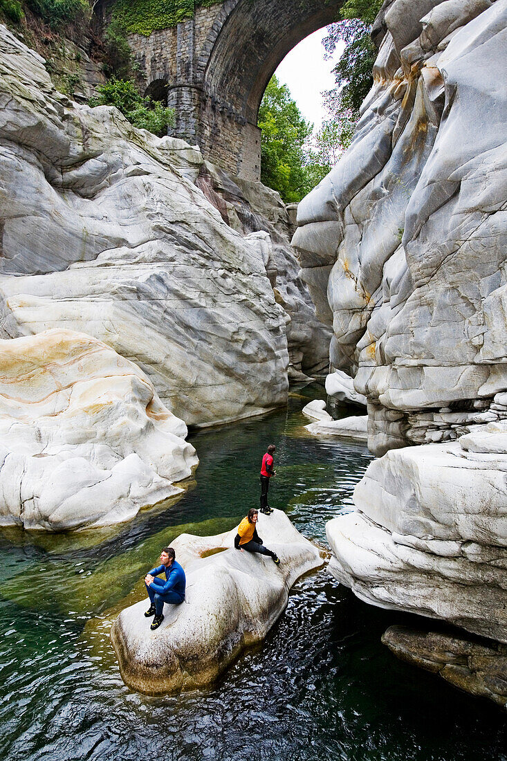 Young woman canyoning, Valle Maggia, Canton of Ticino, Switzerland, MR