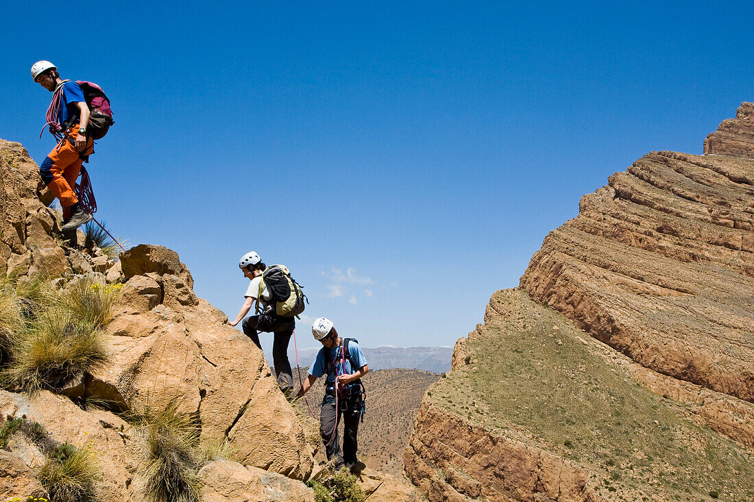 Mountaineers close the summit of Tajoudad, Taghia, Atlas Mountains, North Africa