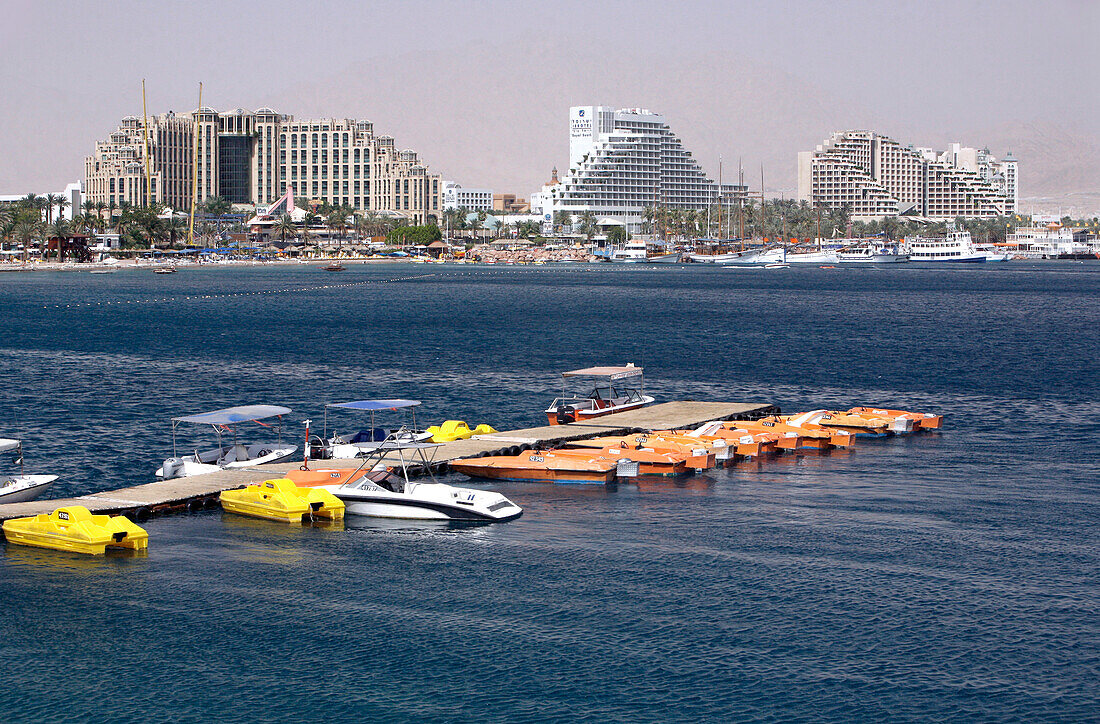 Red sea with jetty and boats, Eilat, Israel