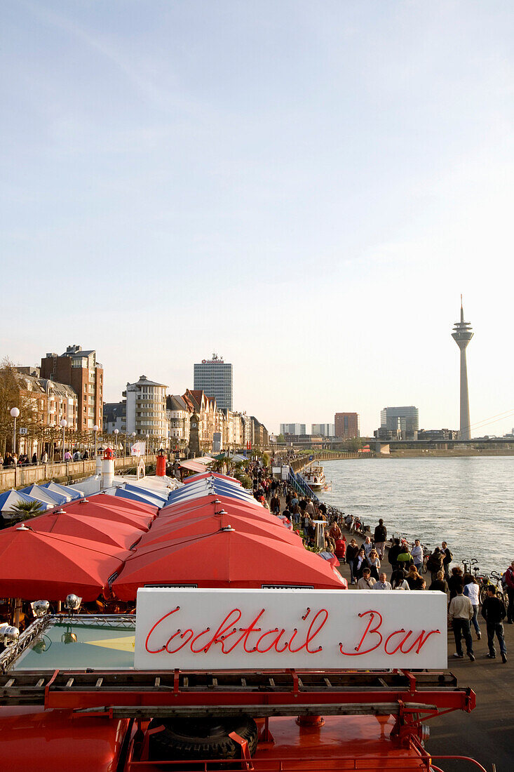 Riverside promenade and gastronomy along the Rhine with television tower in the background, old part of town, Düsseldorf, state capital of NRW, North-Rhine-Westphalia, Germany