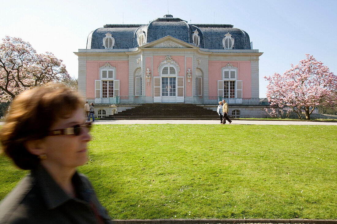 Benrath castle, mature woman passing, Dusseldorf, North Rhine-Westphalia, Germany