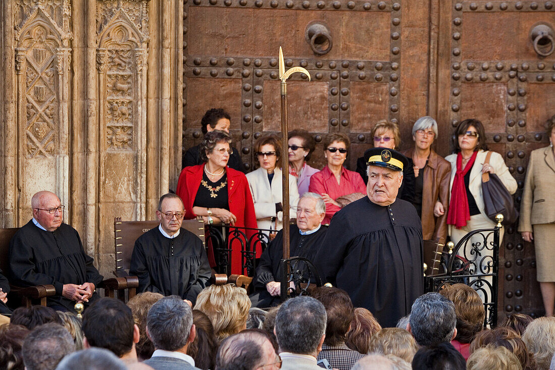 Tribunal de las Aguas, Water court solves disputes on Thursdays at 12 o'clock in front of the Puerta de los Apostels at the cathedral, Valencia, Spain