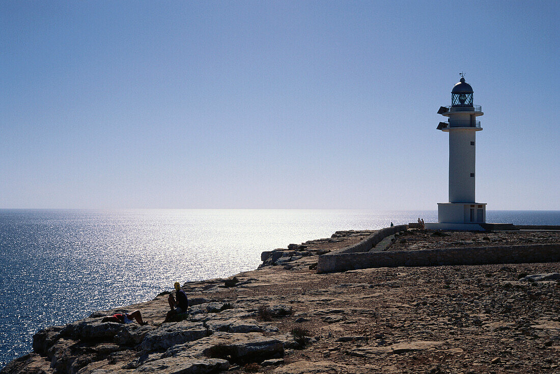 Lighthouse on rocky coast, Formentera, Spain