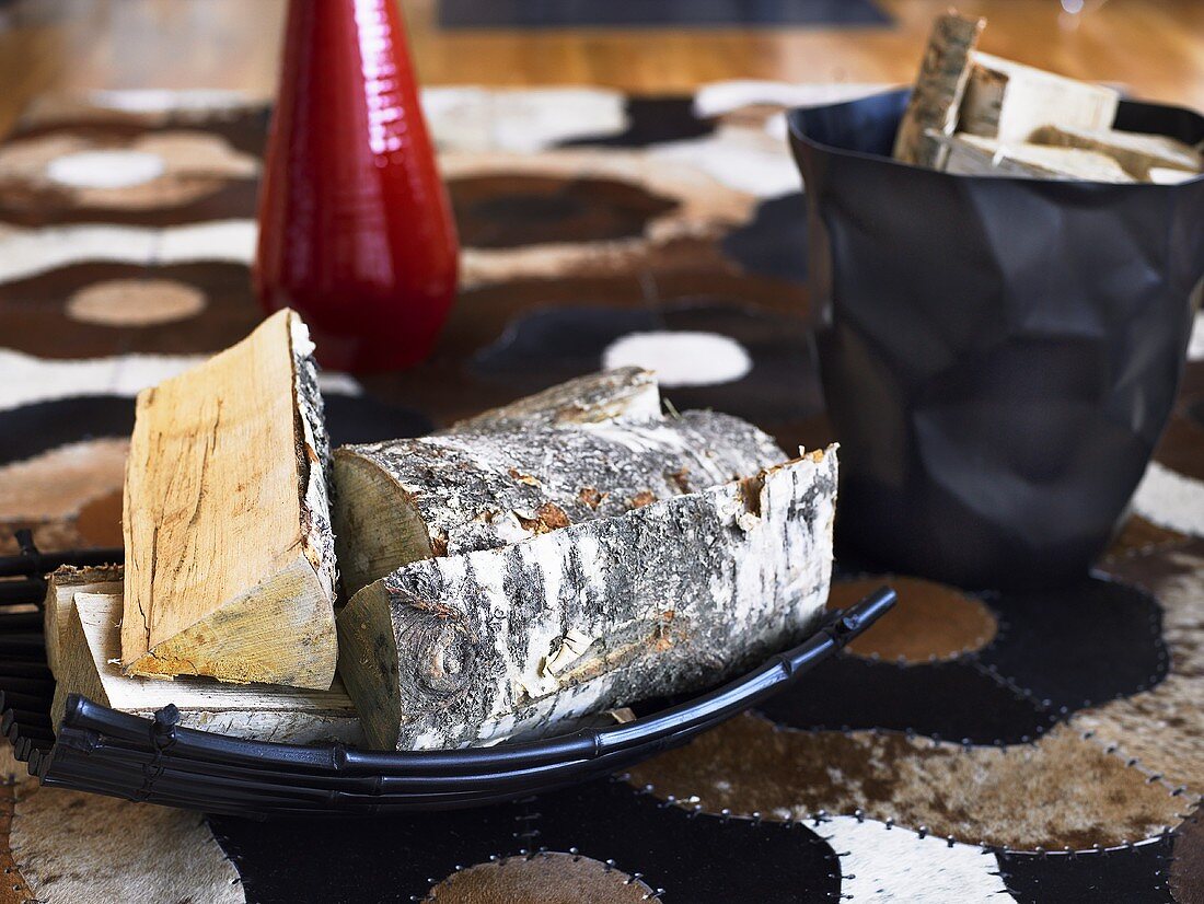 Wooden logs on a tray and in a carry bag