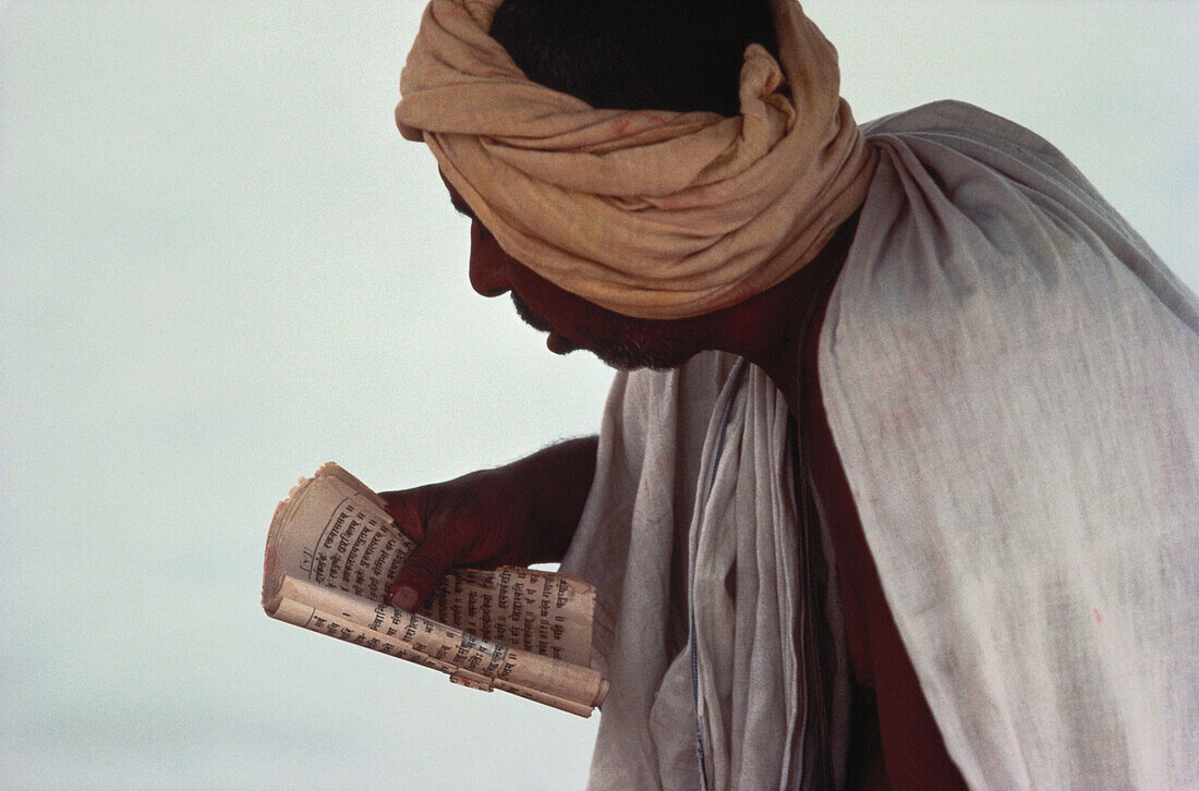 An Arab reading a book, Asia