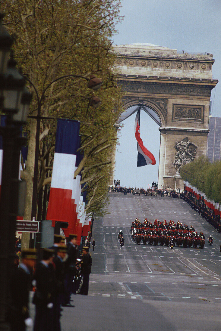 Soldiers marching from Arc de Triomphe, Paris, France