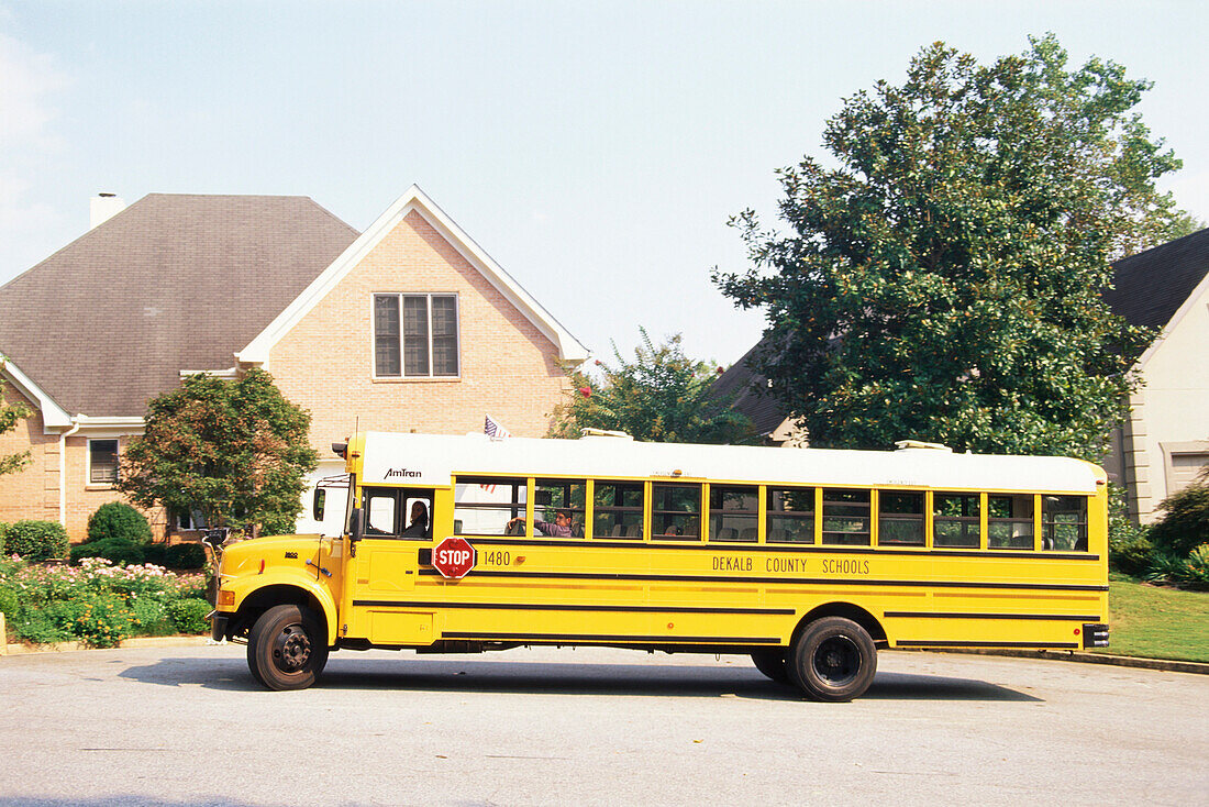 School bus in typical residential community, Atlanta, Georgia, USA