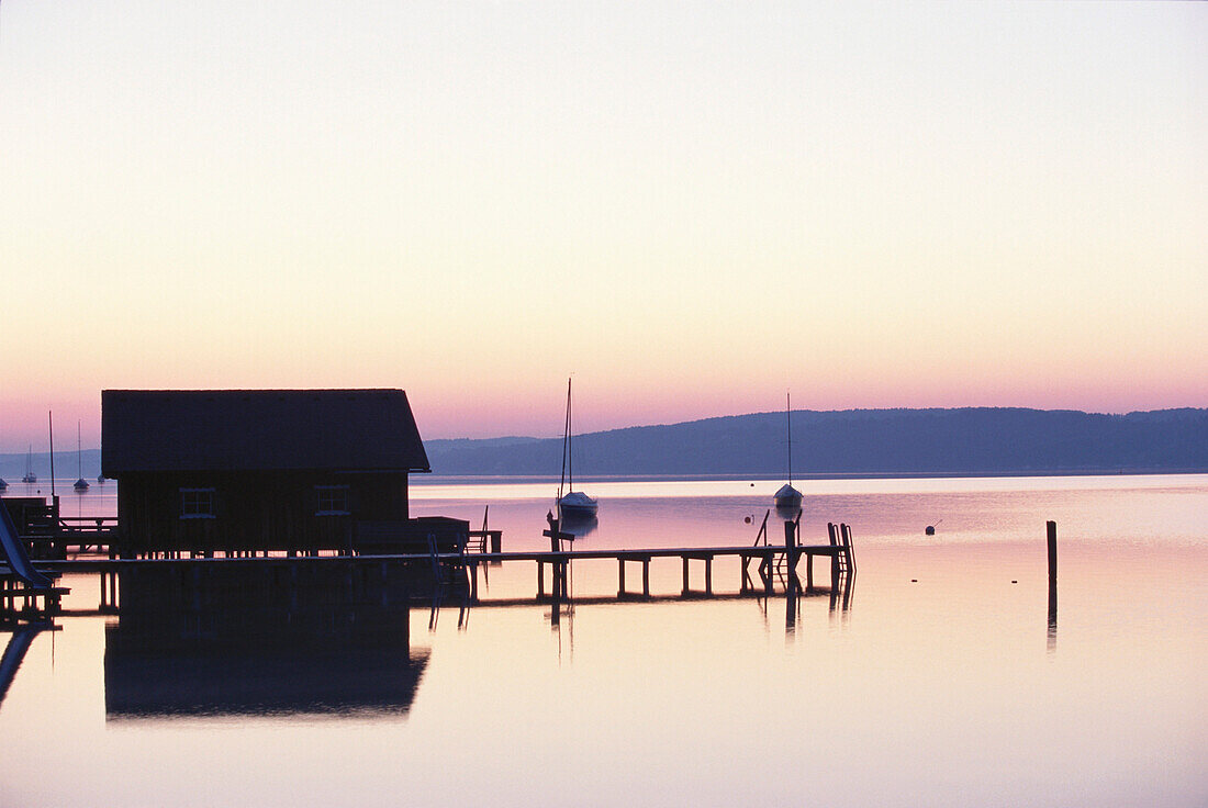 Boathouse in twilight, Lake Starnberg, Bavaria, Germany