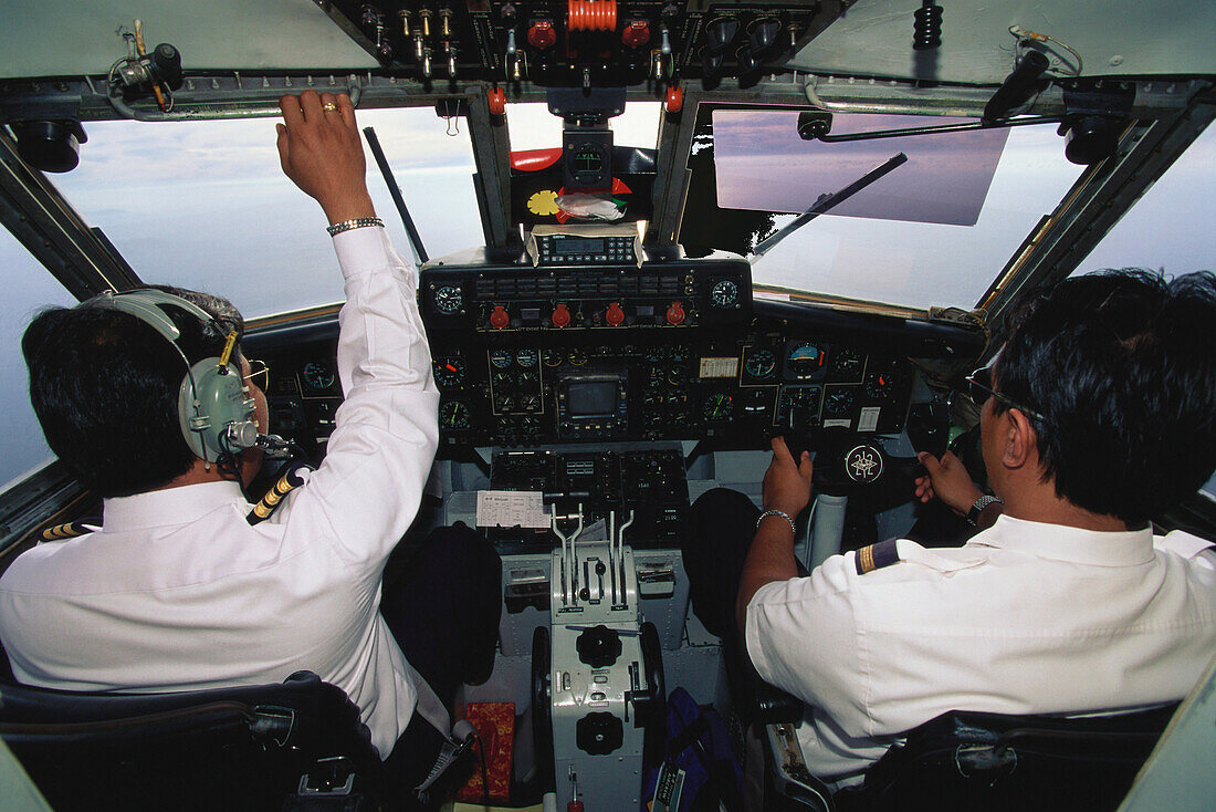 Pilot and Copilot on a Merpati Airplane, Molukken, Indonesia
