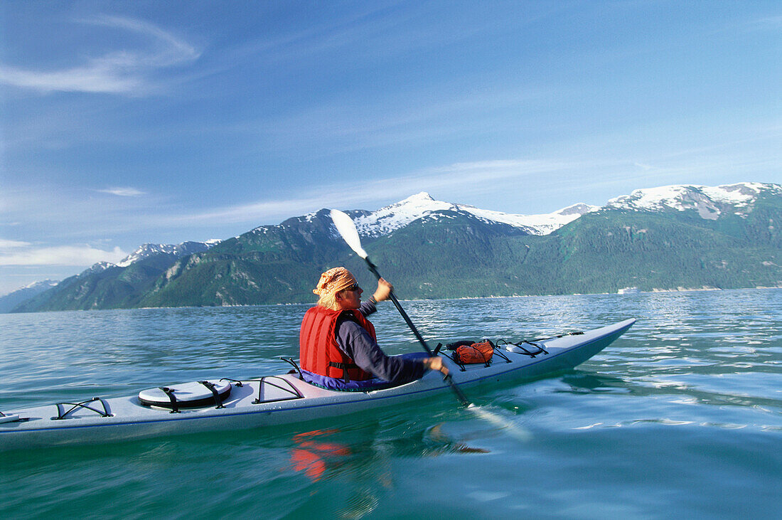 Person in a kayak at Chilkoot Inlet near Haines, Alaska, USA
