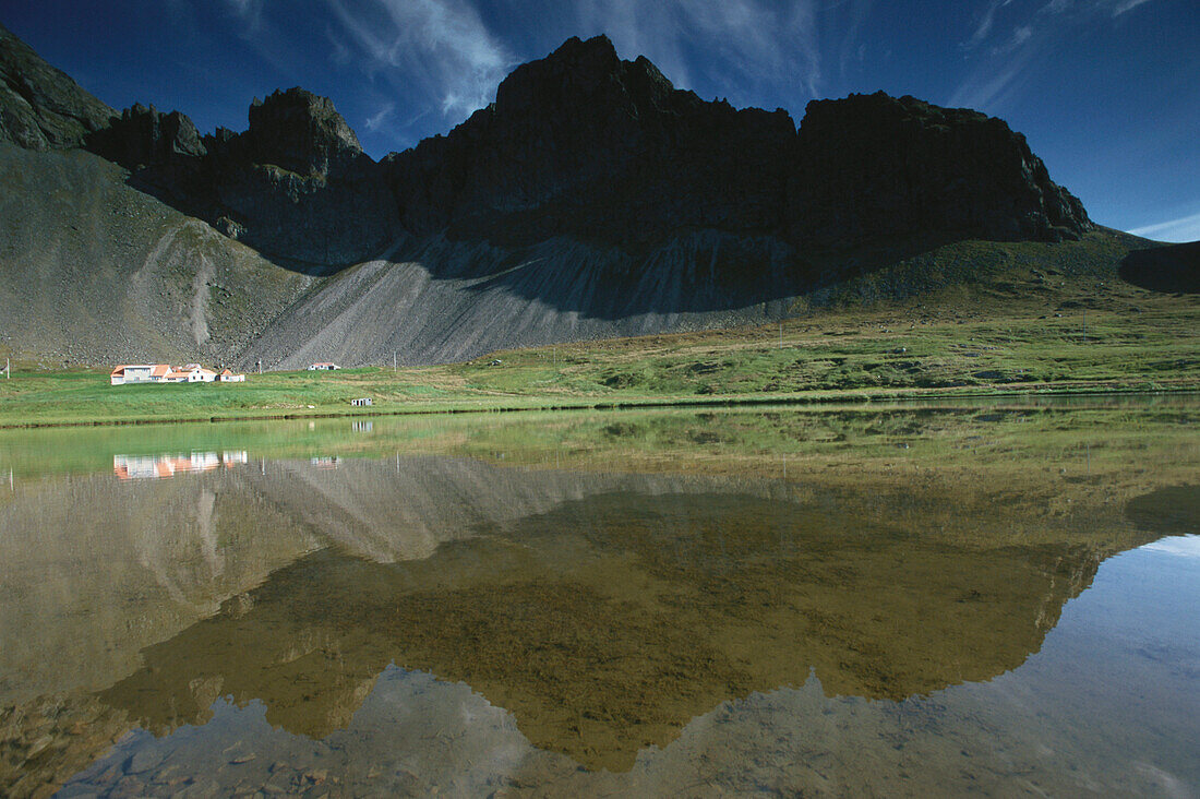 Coastal landscape with water reflection, Vik, Iceland