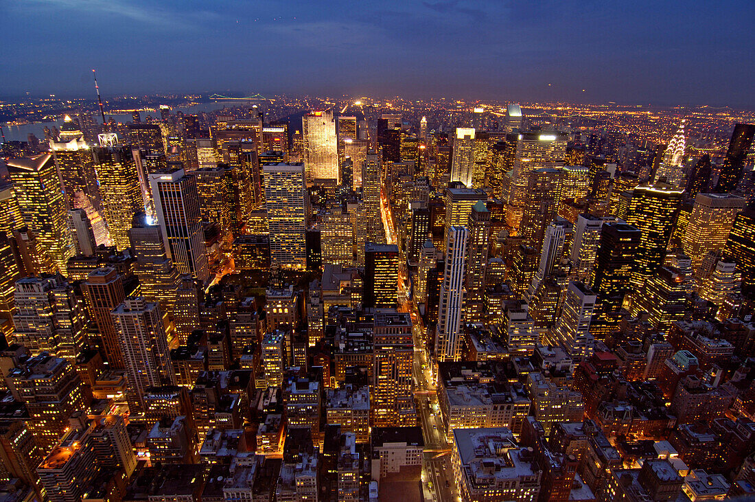 New York Skyline at night towards 5th Avenue, Uptown, taken from Empire State Building, New York City, New York, USA