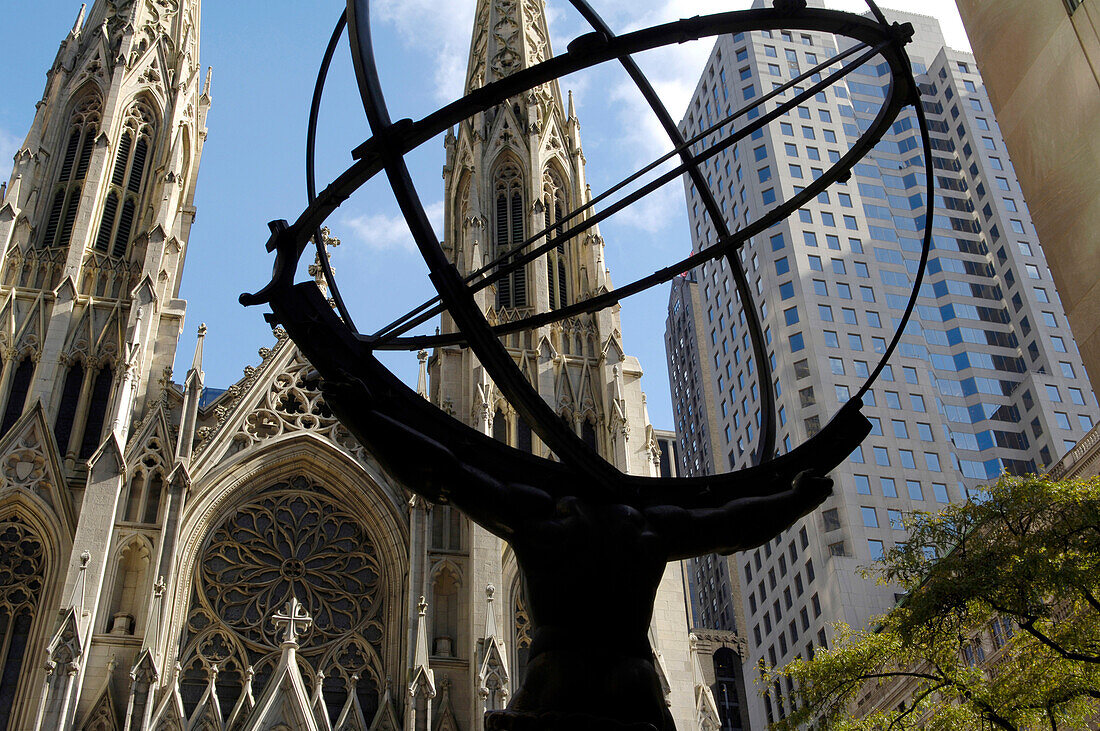 Atlas sculpture and St. Patricks Cathedral, Rockefeller Center, New York City, New York, USA