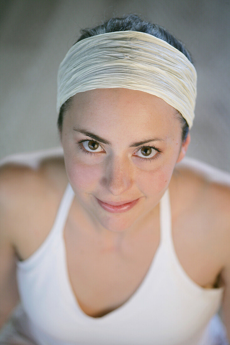 Portrait of a young woman, smiling