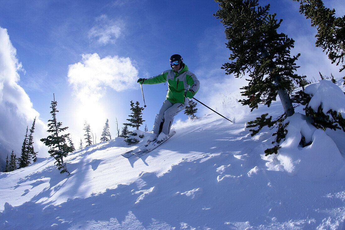Skier skiing down run on Castle Mountain, Castle Mountain Ski Resort, Southern Alberta, Canada
