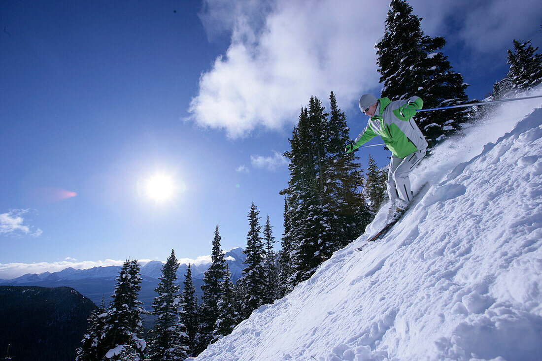 Skier on slope, Lake Louise, Alberta, Canada