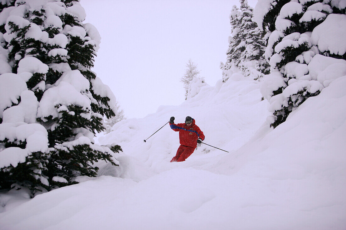 Skier on slope, Sunshine Village ski resort, Banff, Alberta, Canada