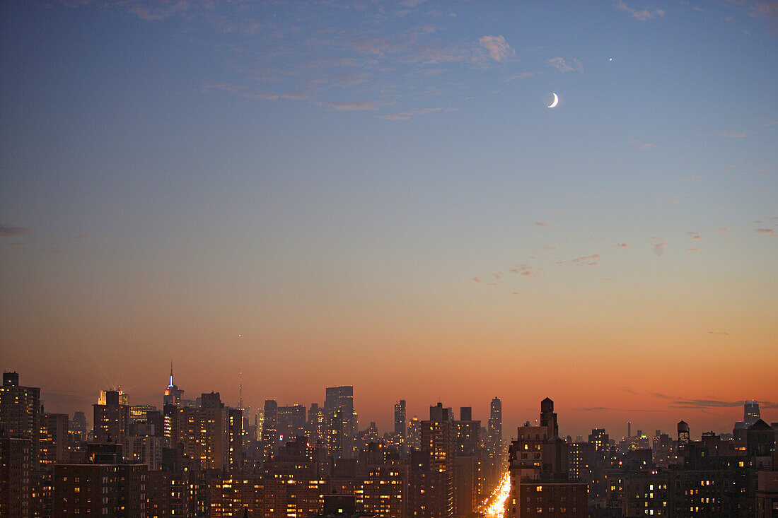 Moon over Amsterdam avenue. Seen from 105th street, Manhattan