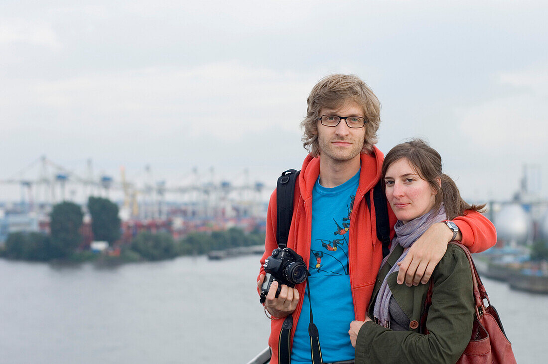 Couple at harbor, Hamburger, Germany