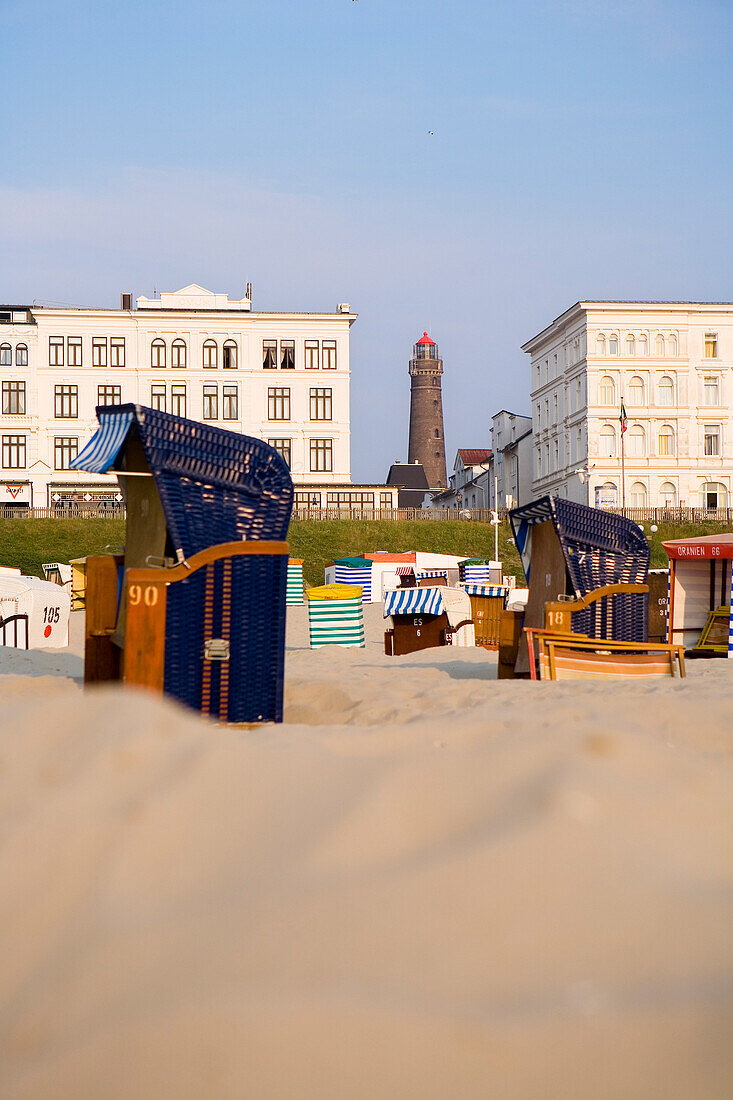 View over beach with beach chairs to lighthouse, Borkum, East Frisian Islands, Lower Saxony, Germany