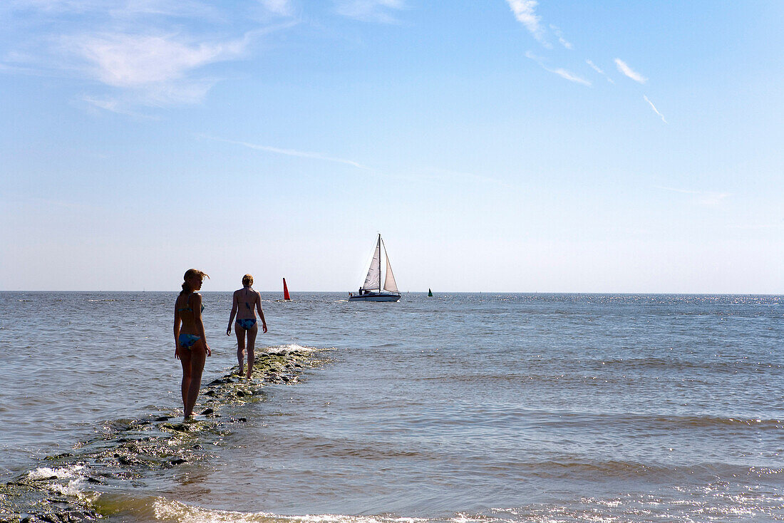 Women in the water,  Norderney, East Frisia, North Sea, Lower Saxony, Germany