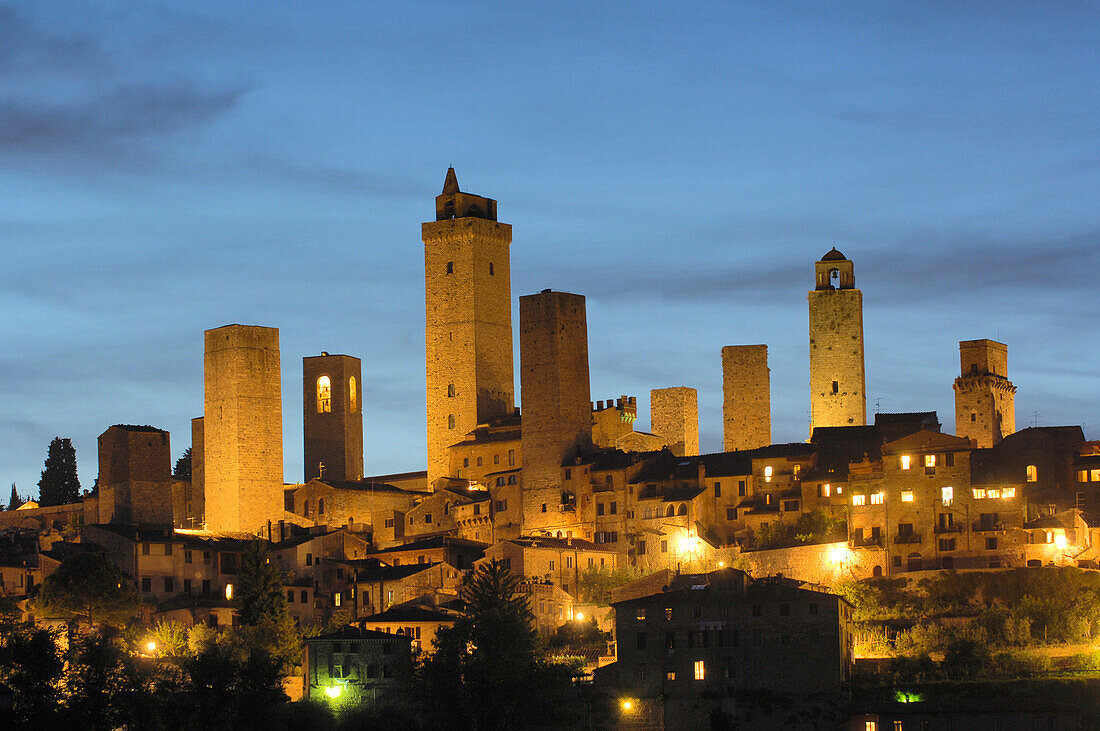 Panorama of a small medieval town at night, San Gimignano, Tuscany, Italy