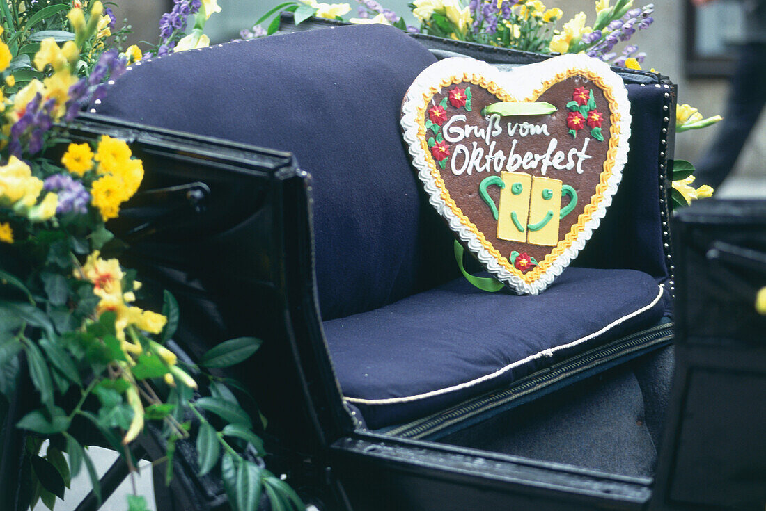 Gingerbread heart in a festive carriage, Octoberfest, Munich, Bavaria, Germany