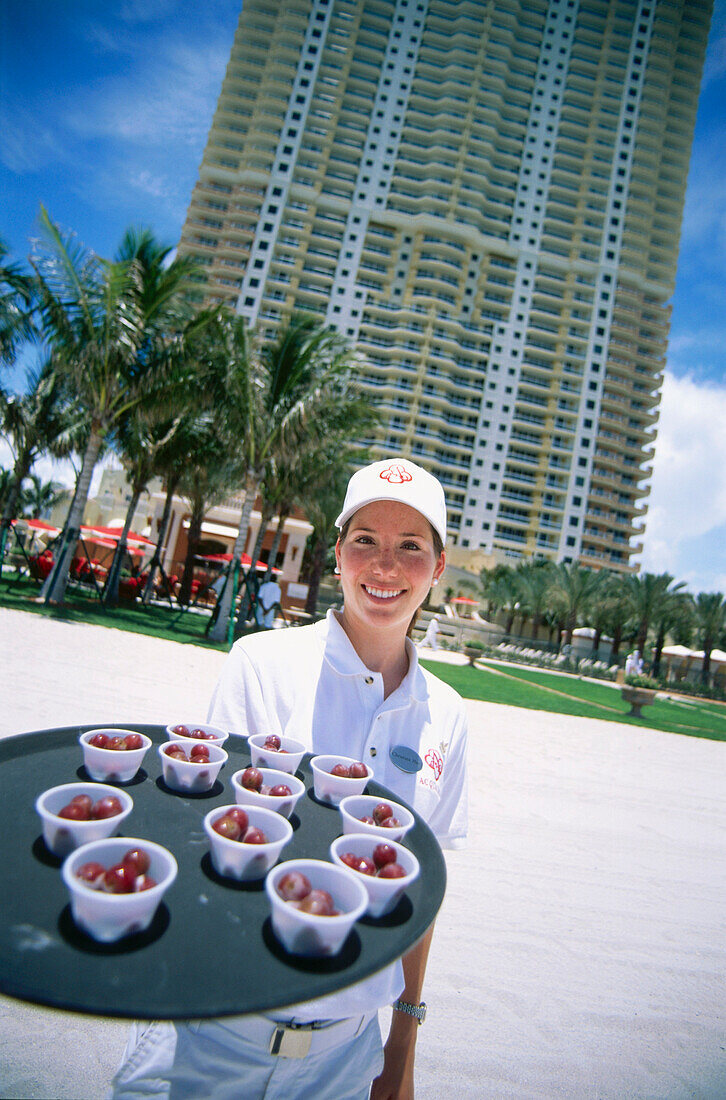 Waitress with refreshments, Hotel Acqualina Resort, Sunny Isles Beach, Miami, Florida, USA