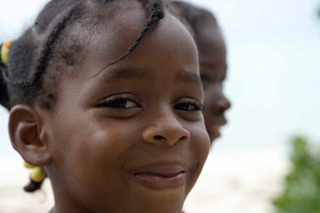 Happy Carriacou Girl smiling, Paradise Beach, Carriacou, Grenada, Lesser Antilles, Caribbean