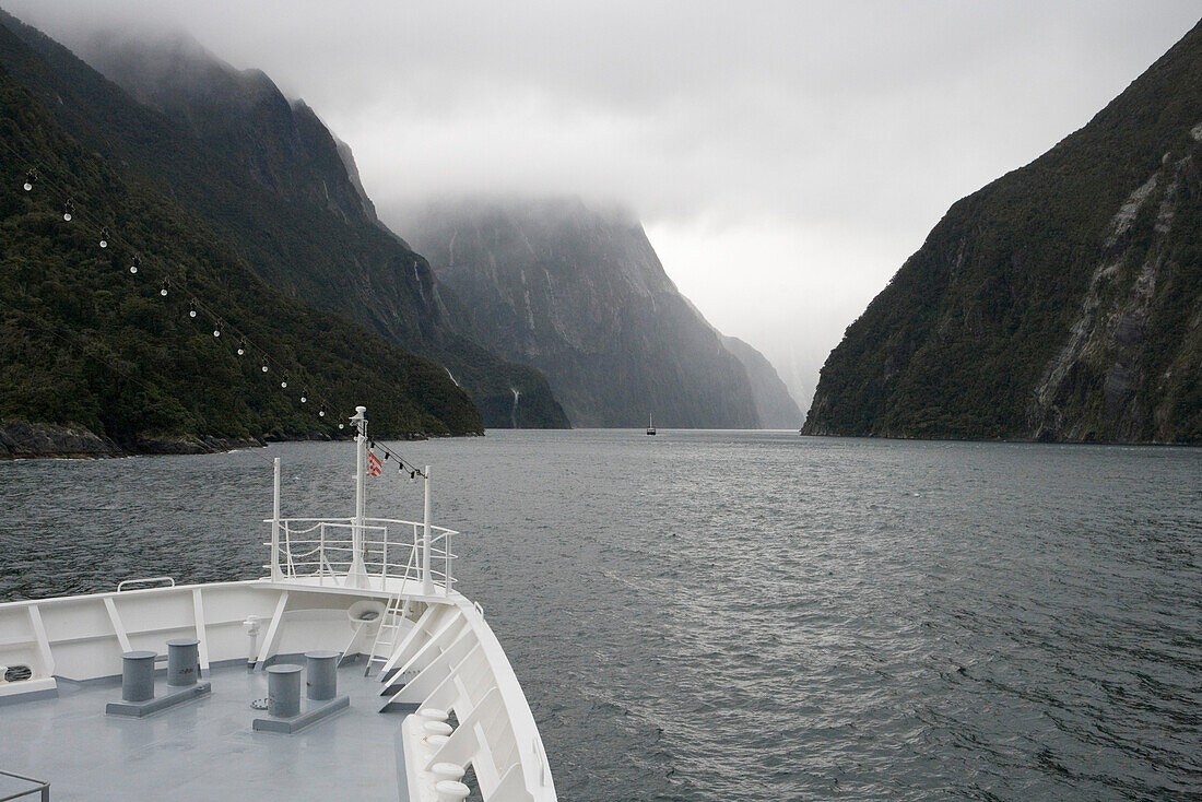 MS Bremen Bow and Stormy Entrance to Milford Sound, Fiordland National Park, South Island, New Zealand