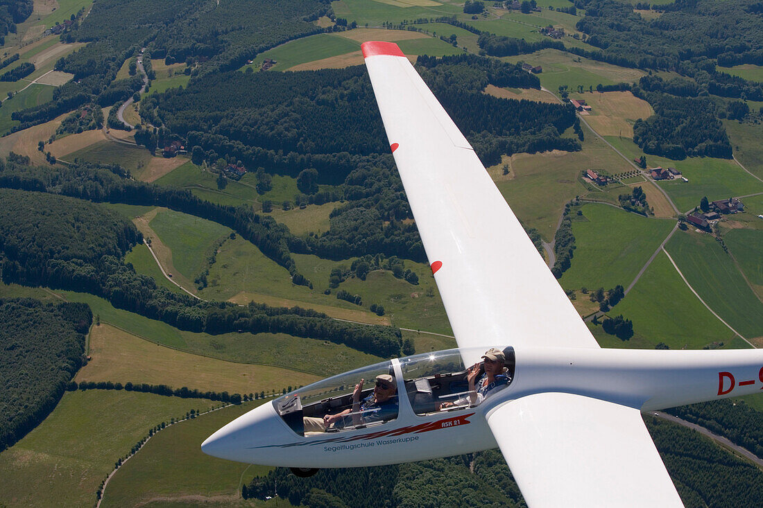 Aerial photo of a glider airplane, near Wasserkuppe Mountain, Rhoen, Hesse, Germany