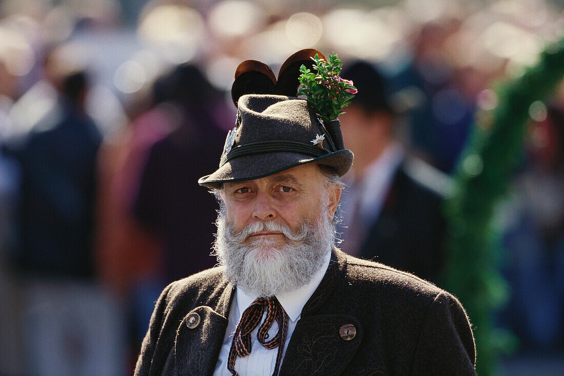 Portrait of a Bavarian man in traditional dress at a procession, Oktoberfest, Munich, Bavaria, Germany, Europe