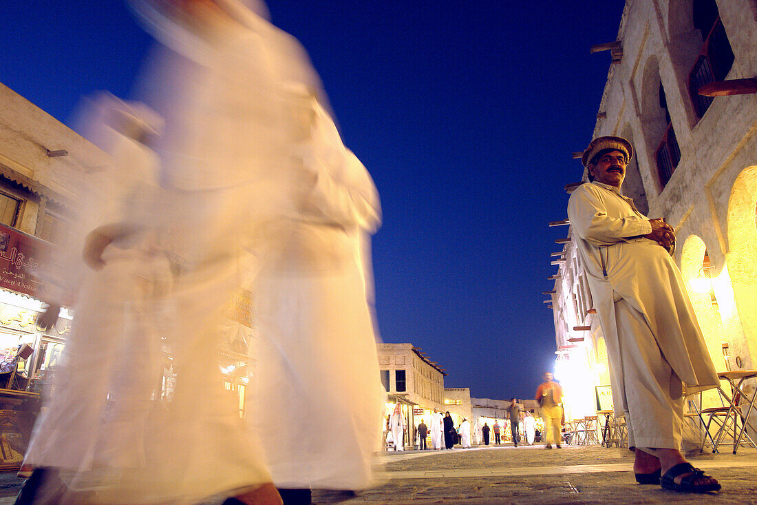 People walking through the city center, Traditional Souk in Doha, Qatar