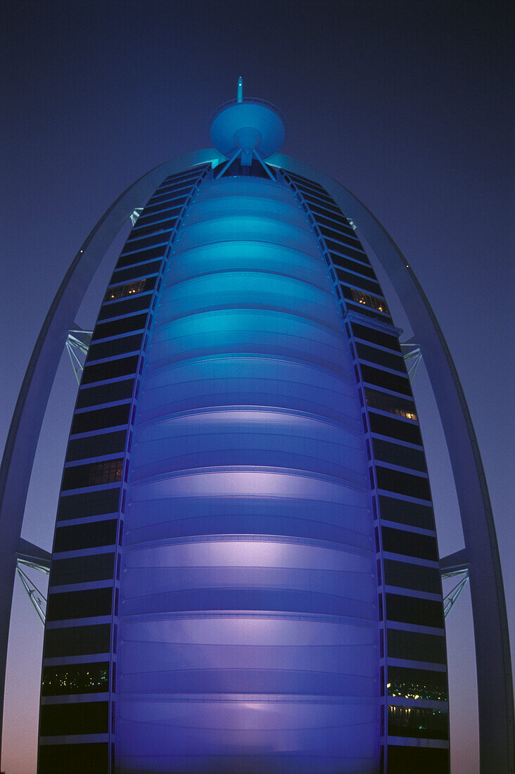 Illuminated view of the Hotel Burj Al Arab at night, Luxury, Dubai, United Arab Emirates