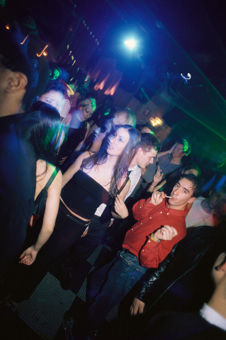 A group of young people, Teenager, dancing inside Discotheque Les Bains Douche, Nightlife, Party, Paris, France