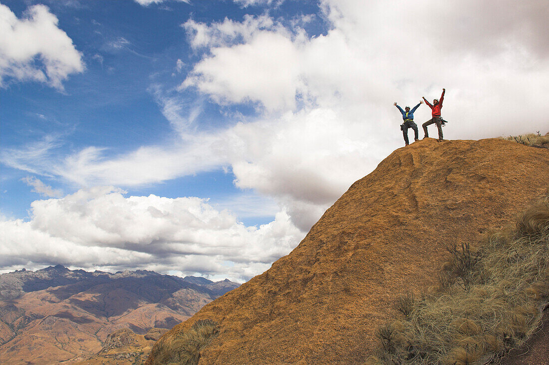 Two people on the summit of Tsaranoro Be, Madagascar, Africa