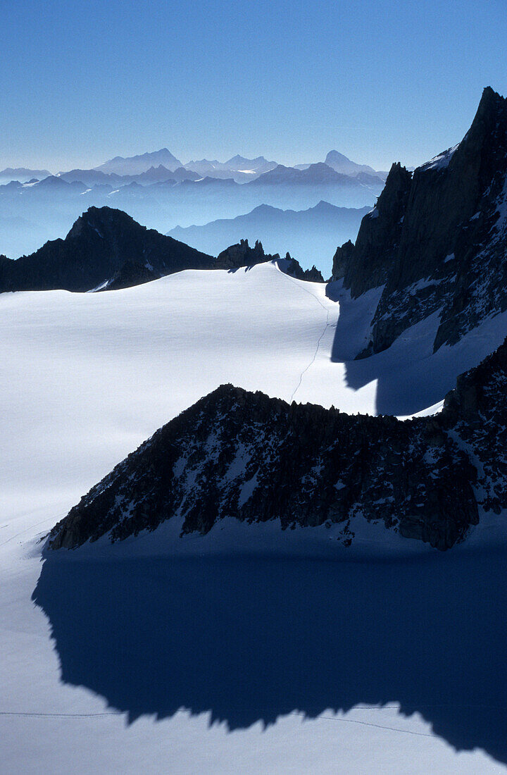 mountain ridges in backlight as backdrop scenery, Mont Blanc range, France
