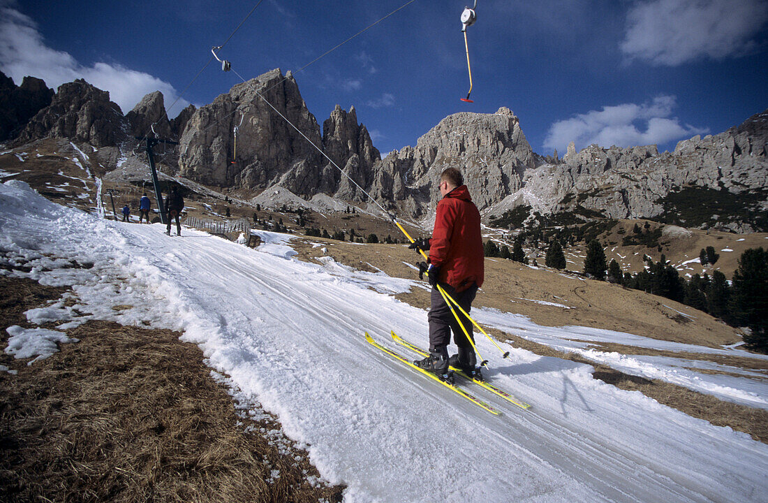 artificial snow at ski lift at Grödnerjoch, Dolomites, South Tyrol, Alta Badia, Italy
