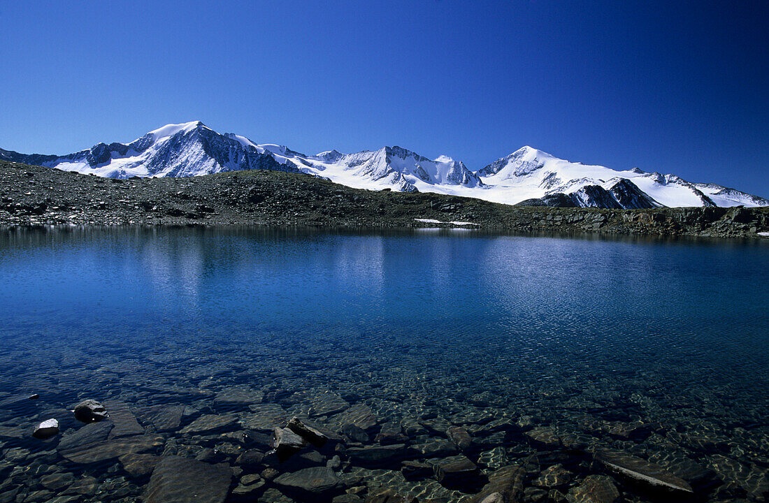 lake Samoarsee with Mutmalspitze and Similaun, Ötztal range, Tyrol, Austria