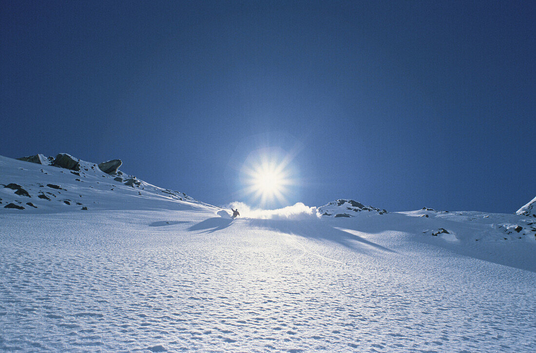 Skiers in backlight, Zuers, Austria