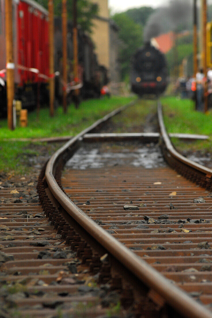 Railway track and steam train at a steam train day in Meiningen, Thuringia, Germany