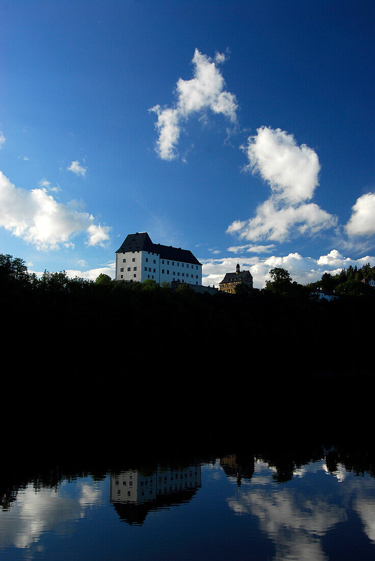 Castle Burgk with reflection in Saale river, Thuringia, Germany