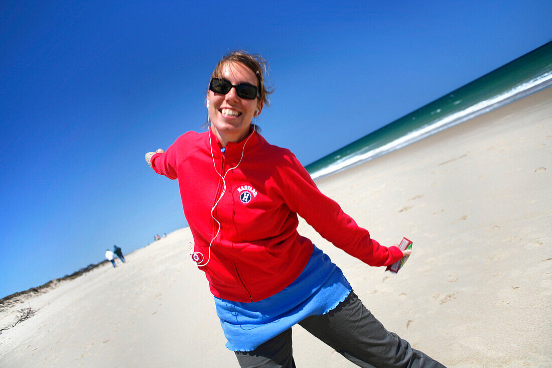 A woman on Nauset Beach, Orleans, Cape Cod, Massachusetts, USA