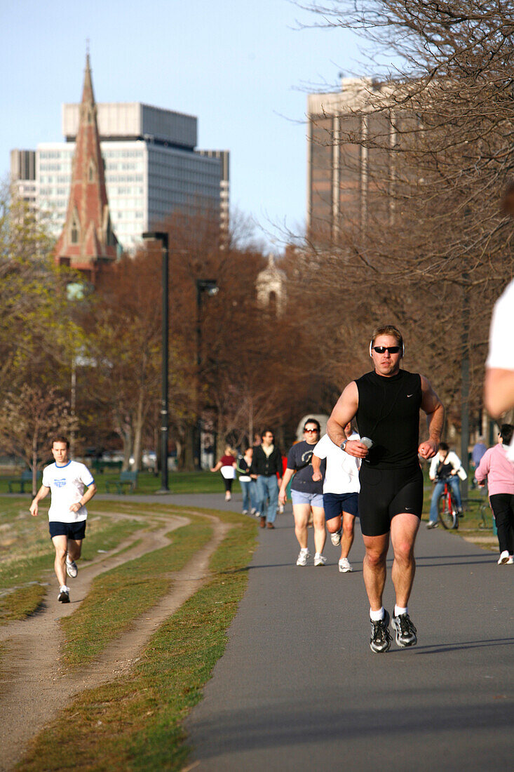 People jogging on the Esplanade, Back Bay, Boston, Massachusetts, USA